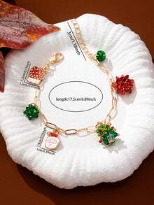 1 Pza Pulsera de Encantos Navideños - Pulsera de Cadena Tono Dorado con Lazo Navideño y Dije de Árbol de Navidad - Joyería Festiva de Elementos Navideños como Regalo para Mujeres y Niñas