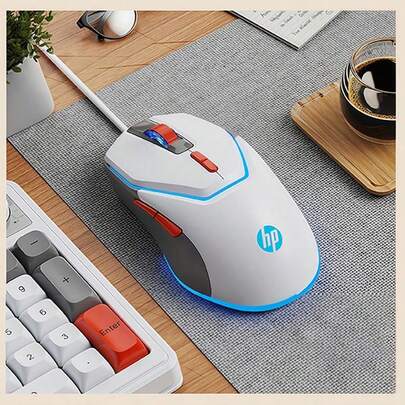 HP Chuột chơi game có dây G360 hỗ trợ lập trình macro, các nút bên có thể lập trình, viền bên bằng cao su chống trượt, giao diện cắm và chạy, thiết kế hai tông màu, tùy chọn ứng dụng đa dạng (trắng và xám).