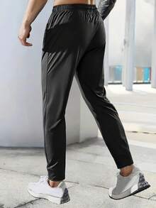 1pc Men's Lightweight Quick-Dry High Elasticity Running Pants With Zipper Pockets - Summer, Solid Black, Drawstring Waist, Suitable For Gym, Hiking And Casual Wear, Casual Sportswear | Fashionable Sweatpants | Durable Activewear - Black - View 5