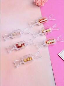 1/4/8/12 PIEZAS Cajas de joyería mini transparentes con forma de caramelo - Cajas de almacenamiento pequeñas y lindas para aretes, anillos, collares y colgantes, organizador portátil de joyas, cajas de regalo de plástico transparente duradero para viajes, fiestas, bodas y uso diario, empaque de joyas perfecto para el Día de San Valentín, envoltura de regalos navideños, regalos de Navidad 2025, decoraciones navideñas para el hogar y accesorios festivos de temporada - Multicolor - Ver 5