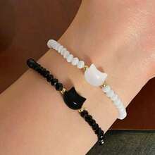 2PCS Adjustable Black & White Cat Beaded Bracelet – What Makes This Piece Special Is Its Thoughtful Combination Of Practicality And Delicate Design. The Adjustable Loop Allows It To Adapt To All Wrist Sizes, Making It A Great Pick For Anyone, Regardless Of Whether You Have A Slender Or Slightly Wider Wrist.