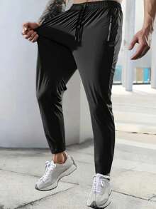 1pc Men's Lightweight Quick-Dry High Elasticity Running Pants With Zipper Pockets - Summer, Solid Black, Drawstring Waist, Suitable For Gym, Hiking And Casual Wear, Casual Sportswear | Fashionable Sweatpants | Durable Activewear - Black - View 2