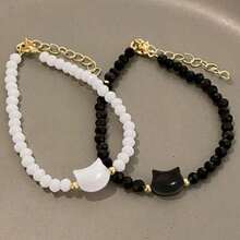 2PCS Adjustable Black & White Cat Beaded Bracelet – What Makes This Piece Special Is Its Thoughtful Combination Of Practicality And Delicate Design. The Adjustable Loop Allows It To Adapt To All Wrist Sizes, Making It A Great Pick For Anyone, Regardless Of Whether You Have A Slender Or Slightly Wider Wrist.
