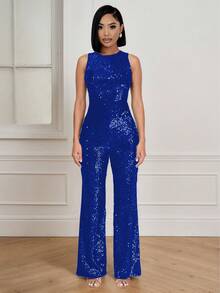Tuta elegante senza maniche con pantaloni ampi e paillettes, tuta intera da donna di colore blu reale per feste, con zip