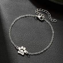 18K镀金不锈钢可爱狗狗爪印手链，可定制宠物名字，是送给宠物主人和生日的理想礼物，也是一份意义非凡的纪念礼物。设计优雅，百搭耐用。这款定制名字手链同时也是串珠手链，适合珠宝收藏家和女士佩戴。女士珠宝，提供刻字服务。 - 彩色 - 查看 5