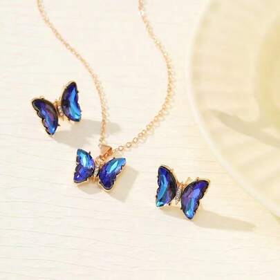 1 set de collier et boucles d'oreilles papillon