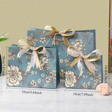 1 件创意节日礼品包装袋、蝴蝶结丝带提手纸袋、情人节礼品袋、生日礼品袋、宰牲节分发、儿童开斋节礼物、礼品袋