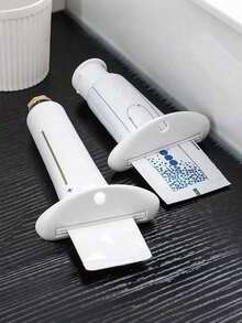Automatic Toothpaste Squeezer Wall Mount Non-Drilling Toothpaste Dispenser For Bathroom Wall Non Perforated Home Bathroom Minimalist Style Bathroom Storage Tool -Wall-Mounted Toothbrush Holder With Squeezer For Kids And Adult No Power Required Plastic Bathroom Accessory For Simplified Toothpaste Dispensing