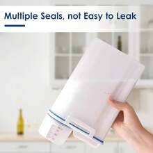 Contenedor de Almacenamiento de Arroz de 2 Kilogramos, Contenedor de Alimentos Sellados y Secos con Tapa de Tazaétrica, Caja de Distribución de Granos de Plástico Transparente, Sin BPA - 1 - Ver 8