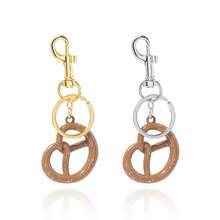 1pc Women's Fashion Keychain - Pretzel Shaped Keyring With Gold Accents, Durable Metal Ring Suitable For Bags, Wallets, Keys - Stylish Everyday Accessory, Cute Key Chain, Bag Charm, Key Organizer, Fun Design, Embossed Details, Gold Hardware, High-Quality Charming Decor, Gift Idea