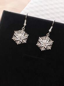 1 par de pendientes únicos de copo de nieve navideño, diseño delicado y de moda, adecuados para uso diario