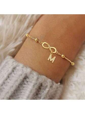 1 pieza Nuevo brazalete de cadena de acero inoxidable dorado con símbolo de infinito y inicial con pavé de circonita para mujeres