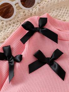 2 Stücke Baby Mädchen Set: Langarm T-Shirt mit mehreren 3D Schleifen Dekor und schwarzem plissiertem Rock