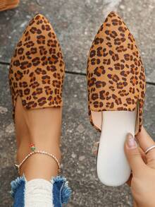 Dark Brown Leopard Print On Brown Background