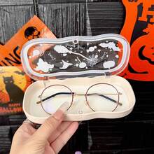 Transparent Portable Glasses Storage Box Featuring Unique Halloween Graffiti, Innovative Anti-Pressure Cloud Design, And Secure Magnetic Closure. Ideal For Storing Myopia Glasses, This Retro Style Storage Box Makes A Perfect Halloween Gift For Fashion Enthusiasts, Combining Functionality With Seasonal Aesthetics For A Stylish Addition To Your Home Decor.
