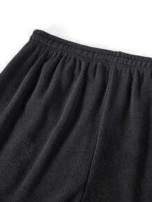 男士纯色抓绒休闲裤，适合秋冬季节穿着，配有可调节抽绳腰带，适合健身，可机洗，纯色设计，穿着舒适，弹性腰带，是户外徒步爱好者的理想礼物。