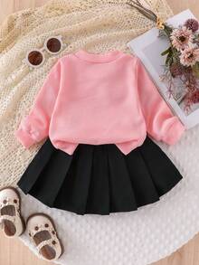 2 Stücke Baby Mädchen Set: Langarm T-Shirt mit mehreren 3D Schleifen Dekor und schwarzem plissiertem Rock