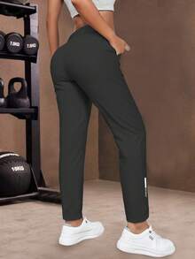 Quần thể thao nữ dáng rộng, cạp chun co giãn, có dây rút, thích hợp cho chạy bộ, yoga, tập luyện, quần bó mùa thu/xuân màu đen. - màu đen - Xem 4