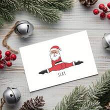 有趣的圣诞老人杀戮圣诞贺卡 - 圣诞老人分裂姿势与“杀戮”文字 - 红色和黑色节日贺卡，适用于办公室、派对或礼物 - 圣诞派对装饰 - 圣诞老人杀戮圣诞老人设计、圣诞贺卡、节日文具、俏皮设计、优质纸质材料、办公文具、古怪文具、耐用文具、办公室工作人员、新奇圣诞贺卡、贺卡、带信封的卡片