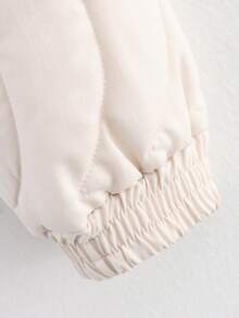 Chaqueta acolchada con cuello alto de mujer en beige, de manga larga con bolsillos, casual para otoño e invierno