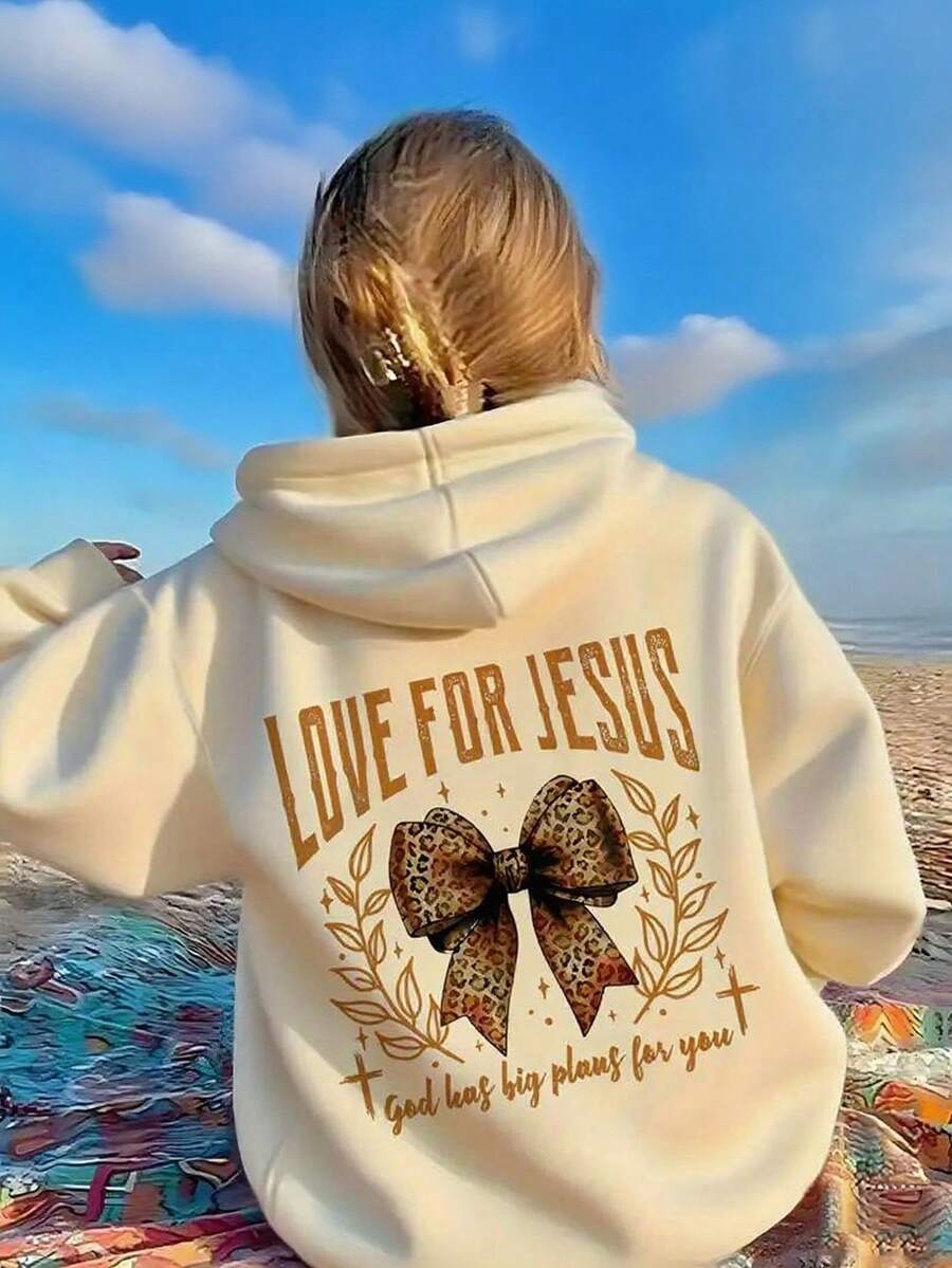 宽松百搭的时尚针织衫，饰有可爱蝴蝶结印花和连帽设计，适合秋冬季作为长袖叠穿上衣，米色可选。 - 杏色 - 查看 1