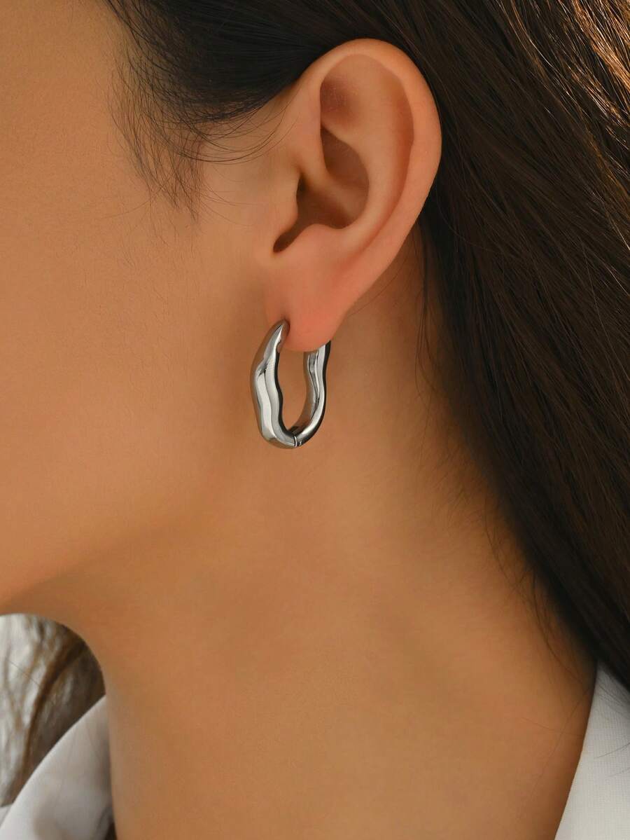 Pendientes asimétricos texturizados · detalle 4