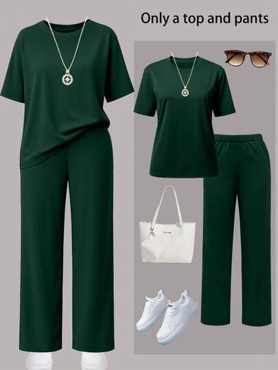 女士休闲纯色圆领短袖上衣搭配松紧腰带口袋阔腿直筒裤两件套，轻薄不透涤纶面料，适合春夏秋季穿着。