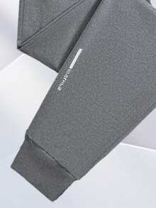 Quần thể thao nam dáng dài, thoáng khí, có dây rút, thích hợp cho mùa xuân, hè, thu và đông, có túi và khóa kéo, phù hợp cho các hoạt động hàng ngày, thể thao, chạy bộ, leo núi, du lịch và mặc thường ngày. - Màu xám đen - Xem 4