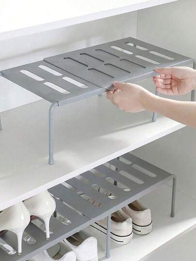 1/2 szt. Jednokolorowy, zdejmowany, teleskopowy stojak na buty, plastikowa półka na buty i kapcie, oszczędzająca miejsce w kuchni, salonie i akademiku. Można umieścić w przedpokoju, pod łóżkiem, w łazience i garderobie. Rozkładany i wzmocniony stojak na buty.