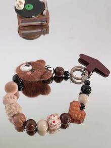 Correa versátil para funda de teléfono con estampado de leopardo, cadena de cordón con oso de peluche marrón cálido con pompón de peluche, adecuada para otoño/invierno