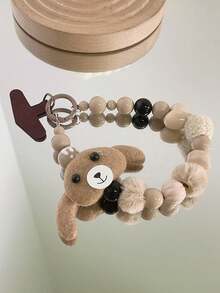 Correa versátil para funda de teléfono con estampado de leopardo, cadena de cordón con oso de peluche marrón cálido con pompón de peluche, adecuada para otoño/invierno