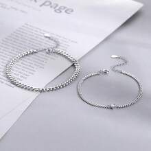 2pcsA Pair Of Couples' Silver Bracelets Crafted With Premium Silver, This Pair Of Bracelets Boasts A Timeless Heart Bangle Design Paired With Delicate Plain Chains. The Silver Material Exudes A Warm, Smooth Texture, And Is Gentle On The Skin-Ideal For Long-Term Wear Without Triggering Allergies.