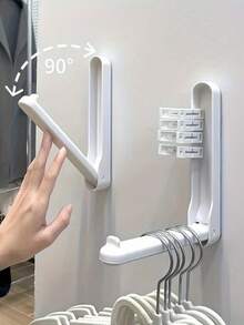 1 pieza Percha de ropa montada en la pared ahorradora de espacio, fácil de plegar, antideslizante, material de plástico duradero, ideal para dormitorio y uso doméstico