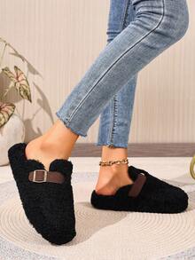 Mules plates noires pour l'automne/l'hiver, chaussons décontractés polyvalents et à la mode pour femmes avec bout rond, franges et boucle décorative