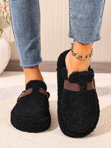 Mules plates noires pour l'automne/l'hiver, chaussons décontractés polyvalents et à la mode pour femmes avec bout rond, franges et boucle décorative