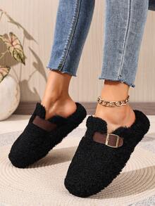 Mules plates noires pour l'automne/l'hiver, chaussons décontractés polyvalents et à la mode pour femmes avec bout rond, franges et boucle décorative