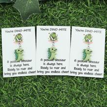 1/3/5 món đồ trang trí treo tường chủ đề "You're DINO - MITE", hình khủng long nhỏ xinh xắn với vòng bạc. Lời bài hát truyền tải cảm xúc tích cực và vui tươi, thích hợp làm quà tặng cho bạn bè để thể hiện sự khích lệ và lời chúc phúc. Cũng có thể dùng để trang trí chìa khóa, túi xách, v.v. Ý tưởng quà tặng cho xe hơi, túi xách, quà tặng cho thầy cô, chị gái, v.v. - màu xanh lá - Xem 10