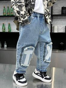 Jeans di moda con vestibilità ampia, effetto consumato e stampa a macchie e graffi per bimbi/bambini piccoli, primavera