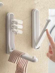 1 pieza Percha de ropa montada en la pared ahorradora de espacio, fácil de plegar, antideslizante, material de plástico duradero, ideal para dormitorio y uso doméstico
