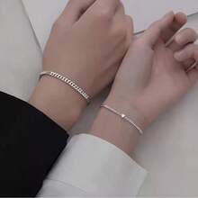 2pcsA Pair Of Couples' Silver Bracelets Crafted With Premium Silver, This Pair Of Bracelets Boasts A Timeless Heart Bangle Design Paired With Delicate Plain Chains. The Silver Material Exudes A Warm, Smooth Texture, And Is Gentle On The Skin-Ideal For Long-Term Wear Without Triggering Allergies.