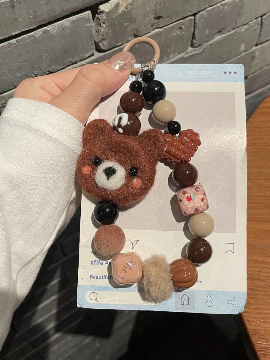 Correa versátil para funda de teléfono con estampado de leopardo, cadena de cordón con oso de peluche marrón cálido con pompón de peluche, adecuada para otoño/invierno