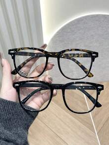 一副经典简约透明眼镜，黑色全框，适合日常生活、办公、阅读、驾驶、使用智能手机等各种场合。 - 純色 - 查看 13