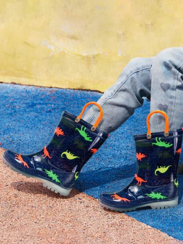 Kinder Dinosaurier bedruckte Regenstiefel, wasserdichte Stiefel mit Doppelohren Design für einfaches Tragen, Schlupf-On PVC Material, leicht, geruchlos, atmungsaktiv, leicht zu reinigen, rutschfest und bequem für Outdoor-Aktivitäten.
