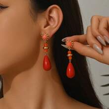 2pcs Fashionable Bohemian Style Teardrop Resin Pendant Tassel Earrings, Gold Heart, Amber, Marble, Cream Floral Pattern, Faux Jade, Gold/Silver Hooks, Elegant Earrings For Women, Suitable For Vacation, Party, Daily Wear, Specially Designed For Dopamine-Loving Sexy Ladies. The Resin Is Colored To Achieve A Jade-Like Effect, Each Piece Has Unique Color And Pattern, Mold Marks And Inlet Ports Are Normal Characteristics.