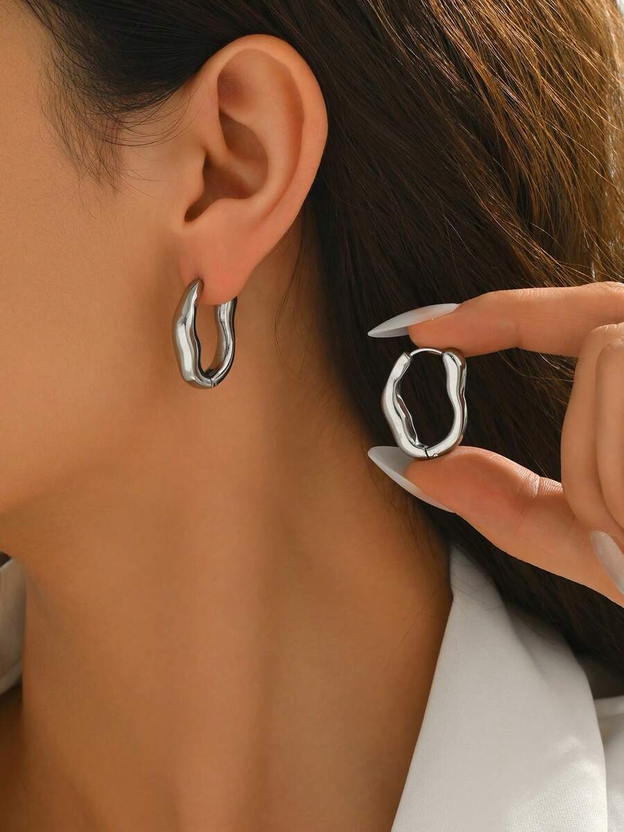 Pendientes asimétricos texturizados · detalle 3