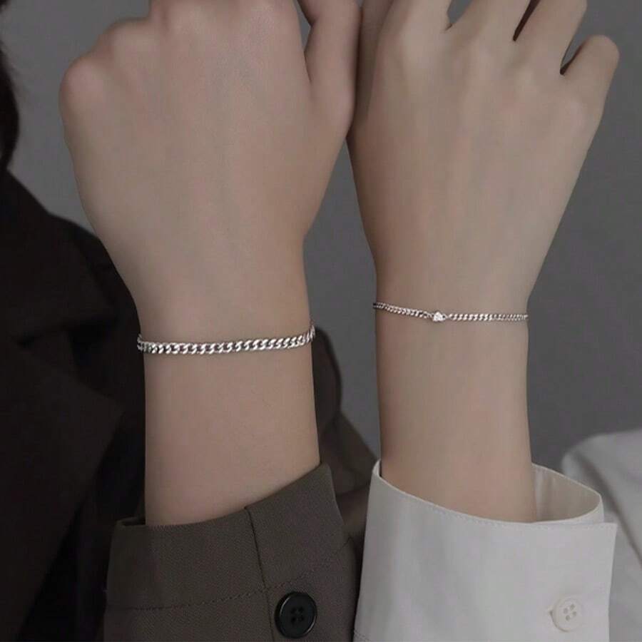 2pcsA Pair Of Couples' Silver Bracelets Crafted With Premium Silver, This Pair Of Bracelets Boasts A Timeless Heart Bangle Design Paired With Delicate Plain Chains. The Silver Material Exudes A Warm, Smooth Texture, And Is Gentle On The Skin-Ideal For Long-Term Wear Without Triggering Allergies.