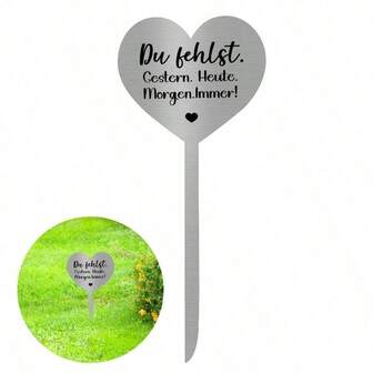 A Heart-Shaped Stainless Steel Grave Ornament With The Words "You Are Missed" Printed On It. Yesterday. Today. Tomorrow. Forever! " Words, Used For The Wind Decoration Of The Tomb Monument.