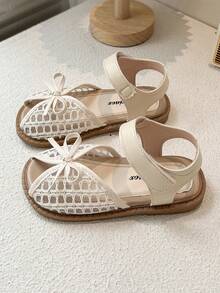 2025夏季新款镂空编织头儿童凉鞋，新款韩版女童蝴蝶结公主裙鞋