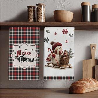 MEMNUN 2 pièces Serviettes de cuisine imprimées avec illustration de bonhomme de neige et flocons de neige à carreaux de Noël "Joyeux Noël", 40*60cm (15,75*23,62 pouces) en microfibre super douce et absorbante. Décoration de maison, décoration de cuisine, décoration de Noël, serviettes à thé pour la cuisine et la cuisson, serviettes de toilette, accessoires de cuisine, lavables en machine. Convient pour les restaurants, les cuisines, la décoration et les cadeaux de Noël, toutes saisons