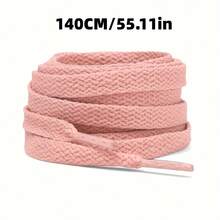 各种款式和尺码的平底休闲鞋，配有平底鞋带